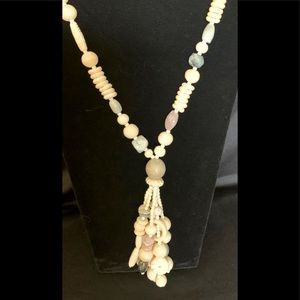Vintage faux bone carved necklace. 18” + 4” dangles